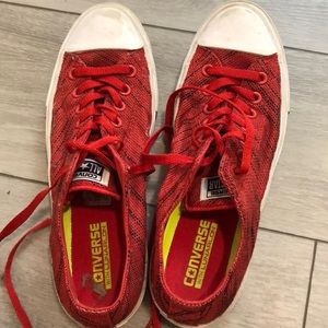 Red and white unisex converse